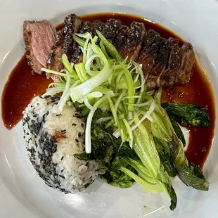 Duck with bok choy and rice