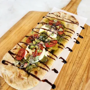 Tomato and Mozz flatbread (CONTAINS NUTS)