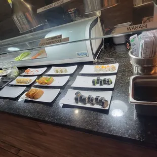 a buffet of sushi and rolls