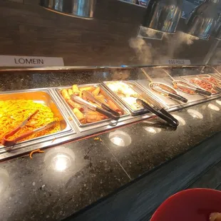 a buffet with many different types of food