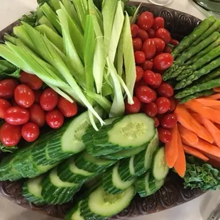 ows a platter of vegetables
