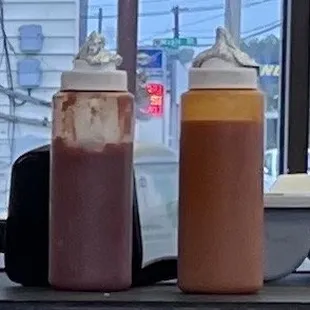 Inside the restaurant- Ketchup and hot sauce on the table with old foil. Please do better - 9/10/23