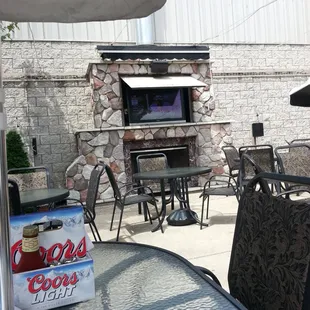 Outdoor patio with awesome TV at Features Sports Bar and Grill in West Salem, WI