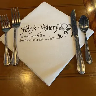 fork, knife and napkin