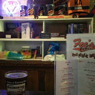 a menu and a cup of coffee