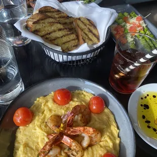 Shrimp and polenta, asparagus, focaccia, Delmonico ribeye