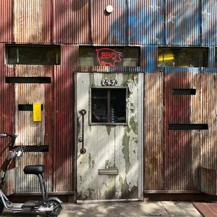 a bicycle parked in front of a building