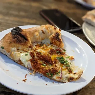 Slice of the Southside with a good helping of chili oil and red pepper flakes