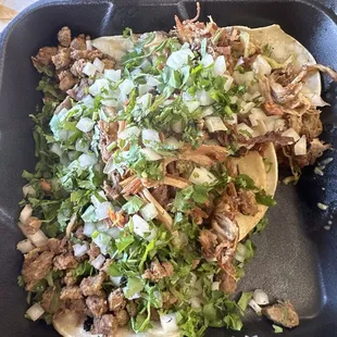 This is the 5 "mini" tacos, and it's not "mini" it's AMAZING!!!!! Three asada two carnitas and so so so so good!