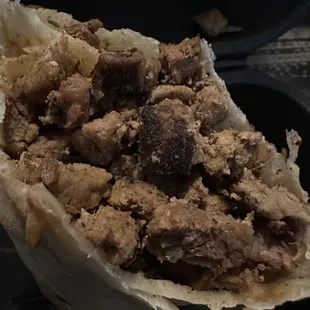 Meat from the burrito that smells awful, look how dry. Probably frozen, thawed, frozen, thawed.....over and over and over!!