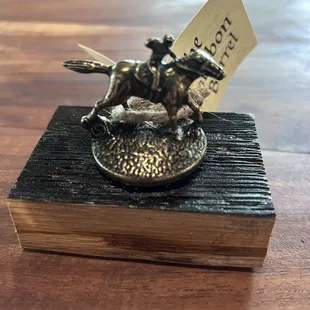 Blanton's cork on a bourbon barrel wood piece