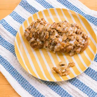 Walnut Danish
 
 Flaky dough topped with candied walnuts, sweet glaze, and cinnamon.