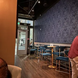 a man sitting at a table in a restaurant