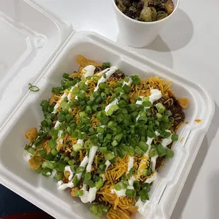 Frito pie with extra green onions &amp; brussel sprouts