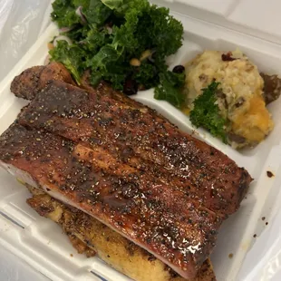 Ribs, chicken, loaded mashed potatoes, and kale salad