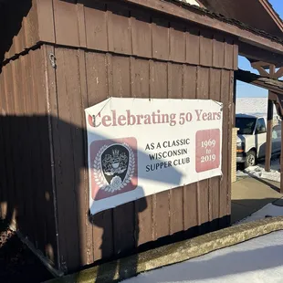 Sign on the front of the structure.