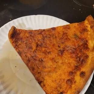 Burnt hard as a rock cheese pizza
