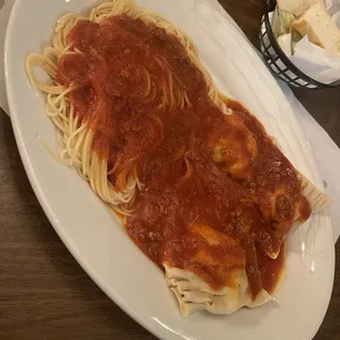 Half meat ravioli/ angel hair with meat sauce