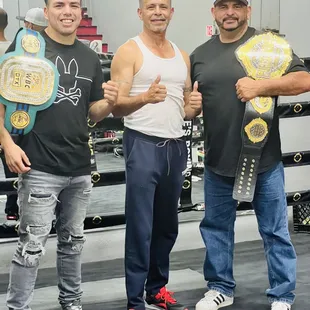 Oscar Martinez and Vladimir Hernandez with their belt.