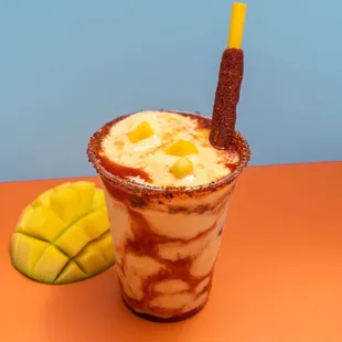 a chocolate milkshake and a mango slice