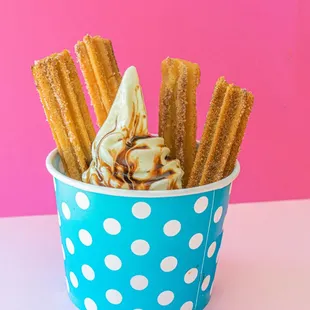 a cup of churros