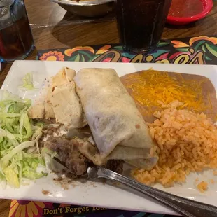 Beef burrito, with rice and refried beans $12least expensive item on the menu