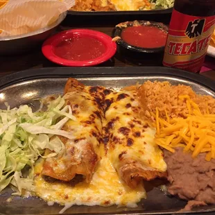 Enchiladas rice and beans.