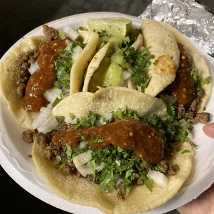 Carne Asada tacos. The red sauce is really spicy