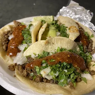three tacos on a plate