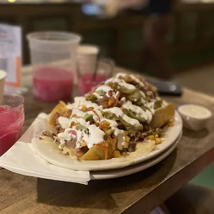 Carnitas nachos and prickly pear margaritas!