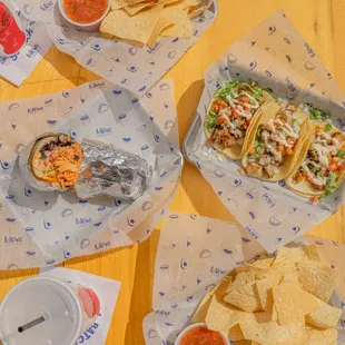 a variety of tacos and chips