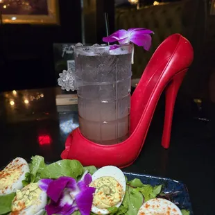 Deviled eggs &amp; Red Bottom cocktail
