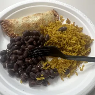 Chicken empanada, rice and beans