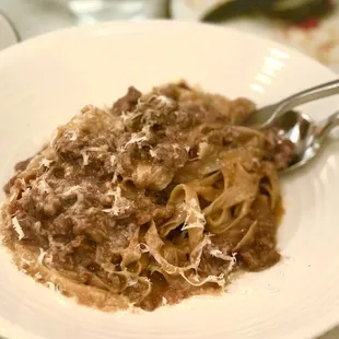 Tagliatelle with a ragu sauce - the noodles are so thin and cooked perfectly!