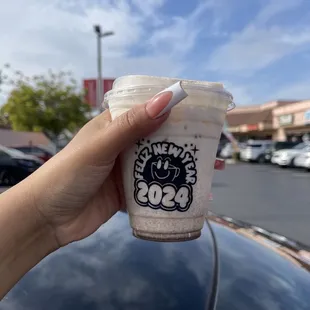 Iced Vanilla chai latte with almond milk and cold foam