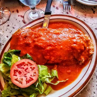 Melanzana alla Parmiggiana: Baked eggplant in marinara sauce with mozzarella cheese. $14