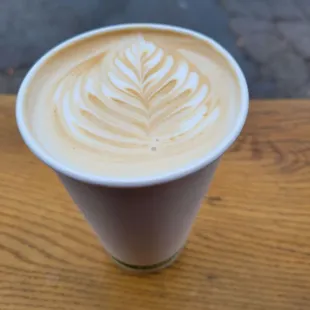 Delicious latte and beautiful latte art