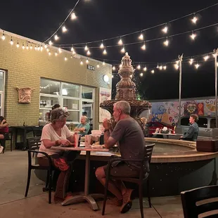 a group of people eating outside