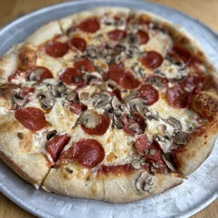 a pepperoni and mushroom pizza