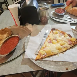 Hawaiian pizza and pepperoni and ham calzone.