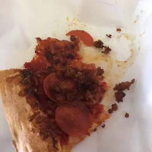 Gross old greasy pizza left over from god knows where and when