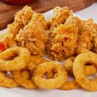 fried onion rings on a plate