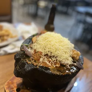 Molcajete with shrimp and steak