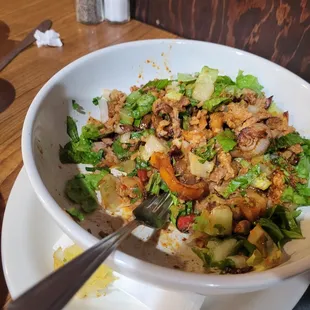 Burrito bowl with al pastor.  Probably halfway eaten at this point, but delicious!