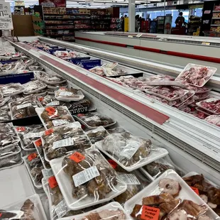 a display of meat and vegetables