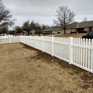 White vinyl fence