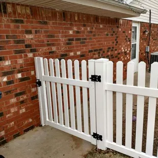 White vinyl fence