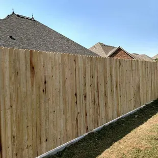 Cedar fence with stem wall