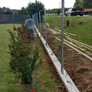 Cedar fence with stem wall