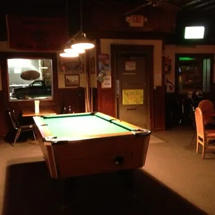 a pool table in a pub